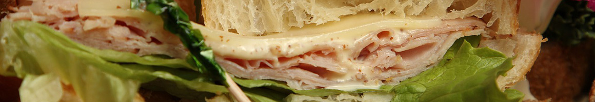 Eating Sandwich Cafe at Ana's Kitchen restaurant in West Simsbury, CT.